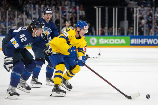 Sami Vatanen of Finland and Jacob Peterson of Sweden