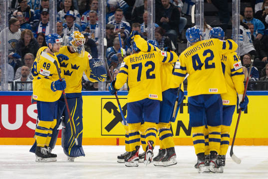 Players of Sweden celebrate