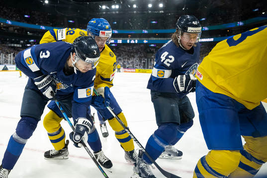 Niklas Friman and Sami Vatanen of Finland against Anton