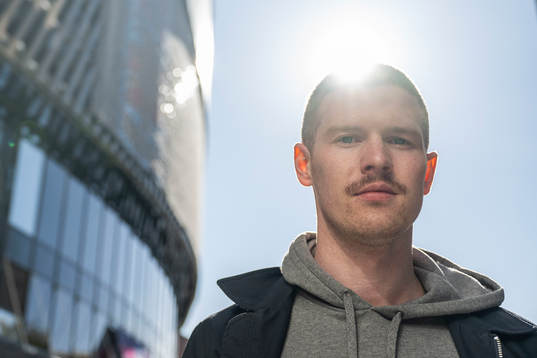 Adam Johansson of Swedish newspaper Expressen poses for a