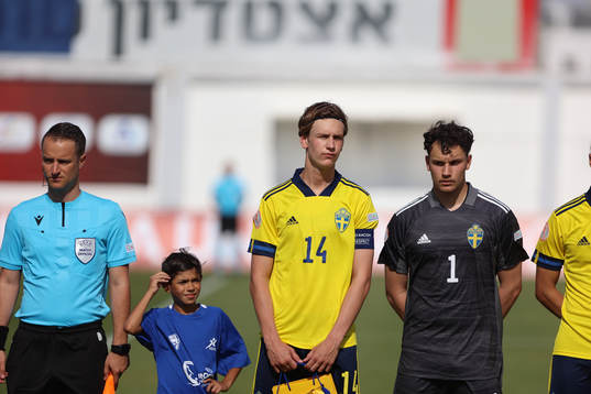 Fredrik Nissen and goalkeeper Elis Bishesari of Sweden