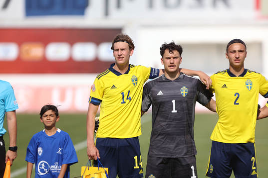 Fredrik Nissen and goalkeeper Elis Bishesari of Sweden