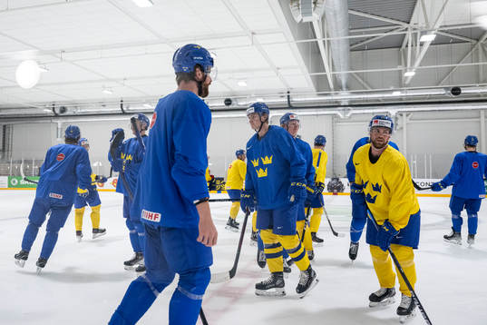 The players at a practice session with Sweden