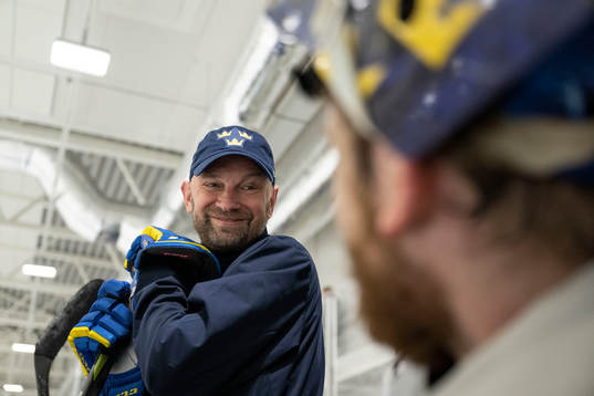 Goaltender coach Stefan Ladhe at a practice session with