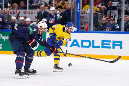 Seth Jones of USA and Oskar Lang of Sweden