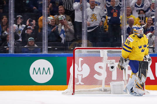 Goaltender Linus Ullmark of Sweden looks dejected