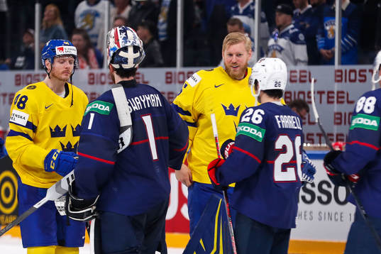 Goaltender Magnus Hellberg of Sweden looks dejected