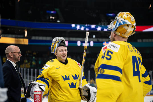 Goaltender coach Stefan Ladhe, goaltender Linus Ullmark and