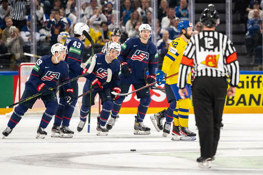 Adam Gaudette of USA celebrates and Emil Bemström of