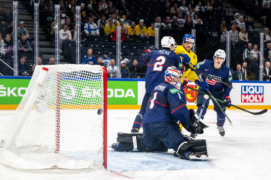 Joakim Nordström of Sweden and goaltender Jeremy Swayman