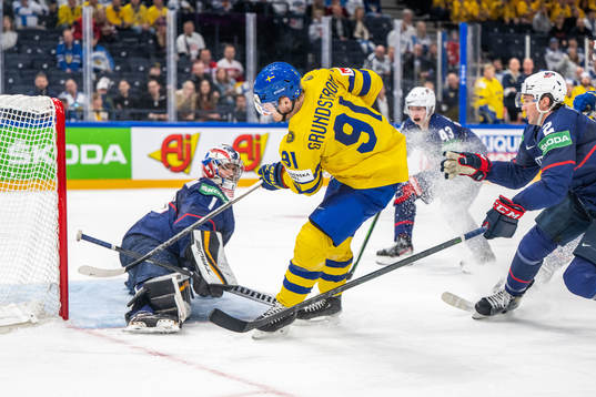 Carl Grundström of Sweden scores 1-2 which later is