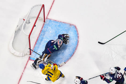 Carl Grundström of Sweden scores 1-2 which later is