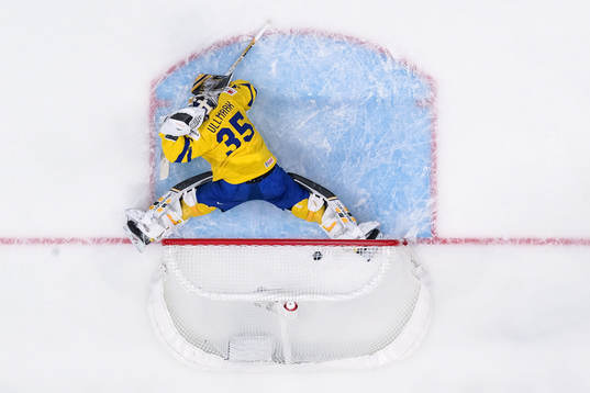 Goaltender Linus Ullmark of Sweden looks dejected