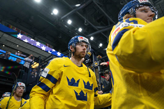 Marcus Pettersson and Rasmus Dahlin of Sweden