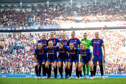 Players of Barcelona pose for a team photo