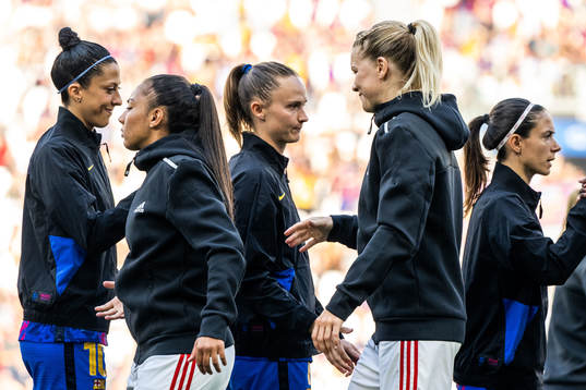 Caroline Graham Hansen of Barcelona and Ada Hegerberg of