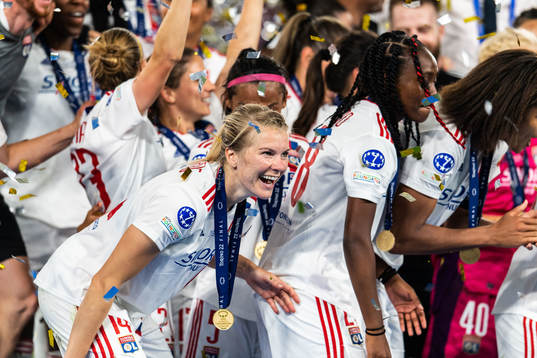 Ada Hegerberg of Lyon celebrates winning the UEFA Women's