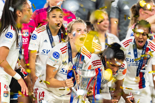 Ada Hegerberg of Lyon celebrates winning the UEFA Women's