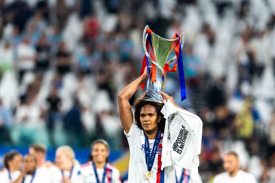Wendie Renard of Lyon celebrates winning the UEFA Women's