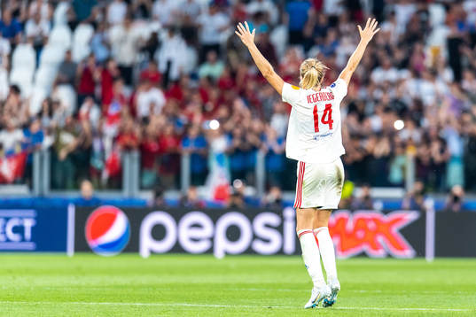 Ada Hegerberg of Lyon celebrates winning the UEFA Women's