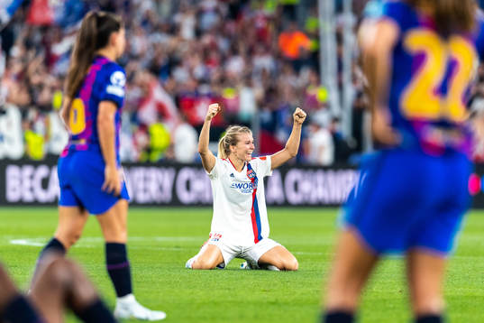 Ada Hegerberg of Lyon celebrates winning the UEFA Women's