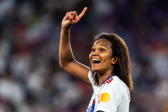Wendie Renard of Lyon celebrates winning the UEFA Women's