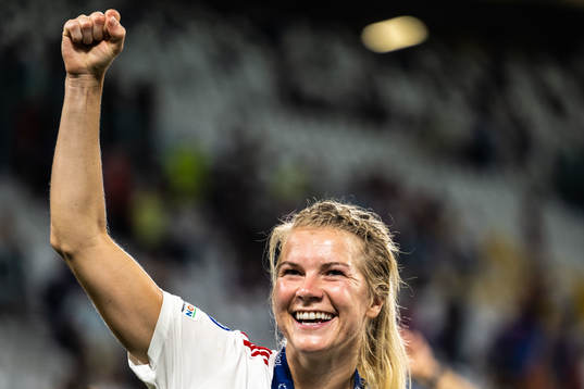 Ada Hegerberg of Lyon celebrates winning the UEFA Women's