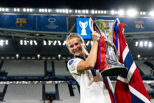 Ada Hegerberg of Lyon celebrates winning the UEFA Women's