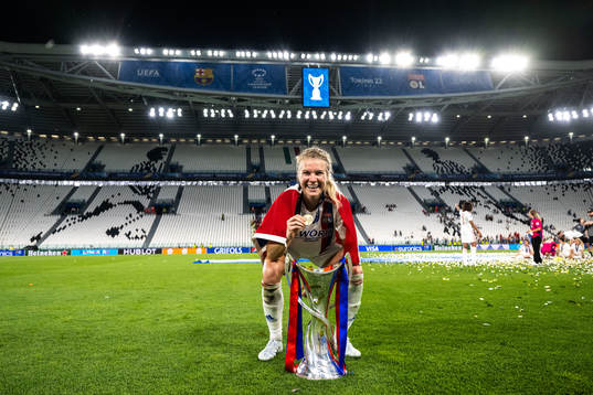 Ada Hegerberg of Lyon celebrates winning the UEFA Women's