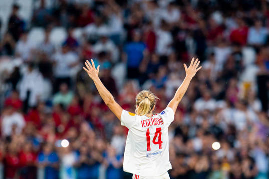 Ada Hegerberg of Lyon celebrates at the final whistle