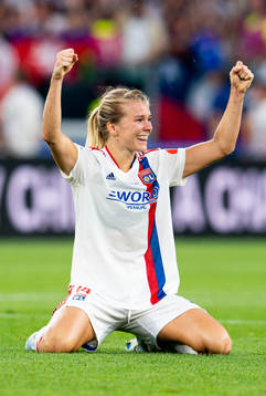 Ada Hegerberg of Lyon celebrates at the final whistle