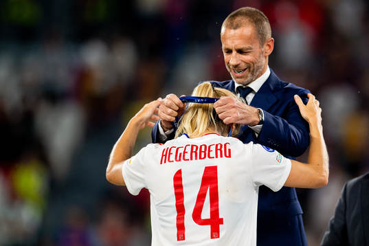 Ada Hegerberg of Lyon receives her winners medal by UEFA