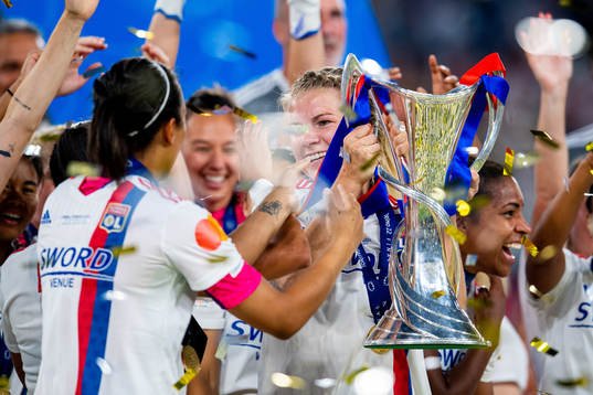 Ada Hegerberg of Lyon with the winners trophy