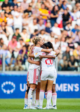 Ada Hegerberg of Lyon celebrates with teammates