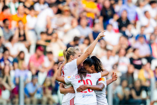 Ada Hegerberg of Lyon celebrates with teammates