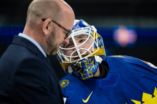 Goaltender coach Stefan Ladhe and goaltender Linus Ullmark