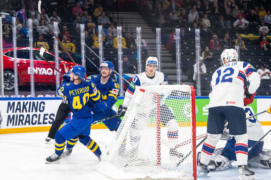 Jacob Peterson and Carl Klingberg of Sweden celebrate 3-0