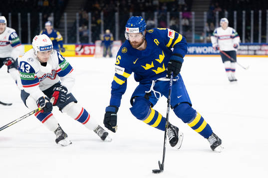 Max Krogdahl of Norway and Adam Larsson of Sweden