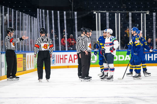 Joakim Nordström of Sweden and teammates waits for a video