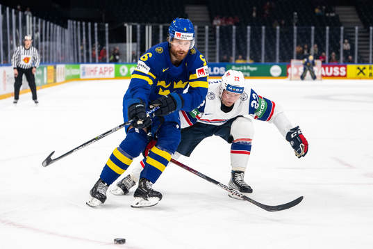 Adam Larsson of Sweden and Martin Røymark of Norway