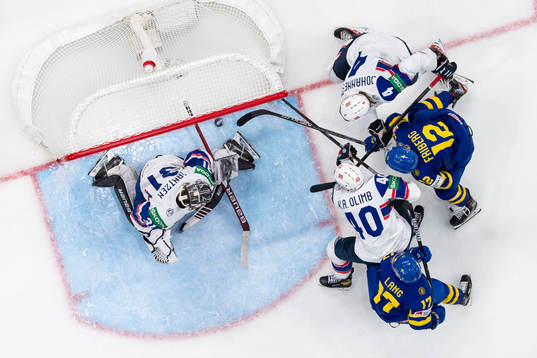 Max Friberg of Sweden scores the 6-1 goal behind goaltender