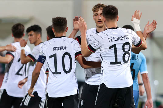 Alexandre Azevedo, Tim Hoffmann and Nelson Weiper celebrate