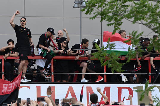 Zlatan Ibrahimovic of Milan celebrates with team mates