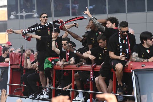 Zlatan Ibrahimovic of Milan celebrates with team mates