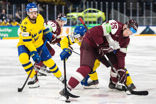 Emil Bemström and Joel Kellman of Sweden against Andris