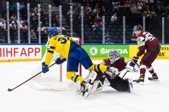 Lucas Wallmark of Sweden and goaltender Arturs Silovs of