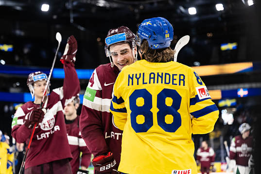 Kristians Rubins of Latvia and William Nylander of Sweden