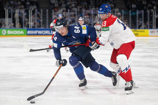 Mikael Granlund of Finland and Jakub Vrana of Czech Republic