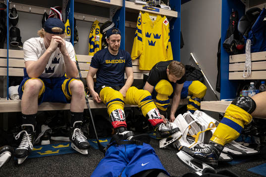 Rasmus Dahlin, Jonathan Pudas and goaltender Linus Ullmark