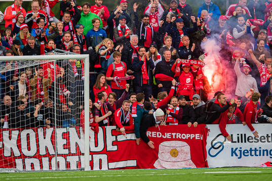 Spectators in the stands celebrates